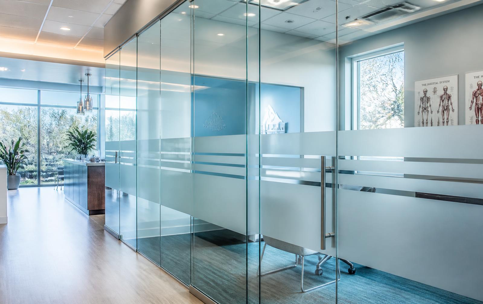 Frosted privacy film on glass office partitions